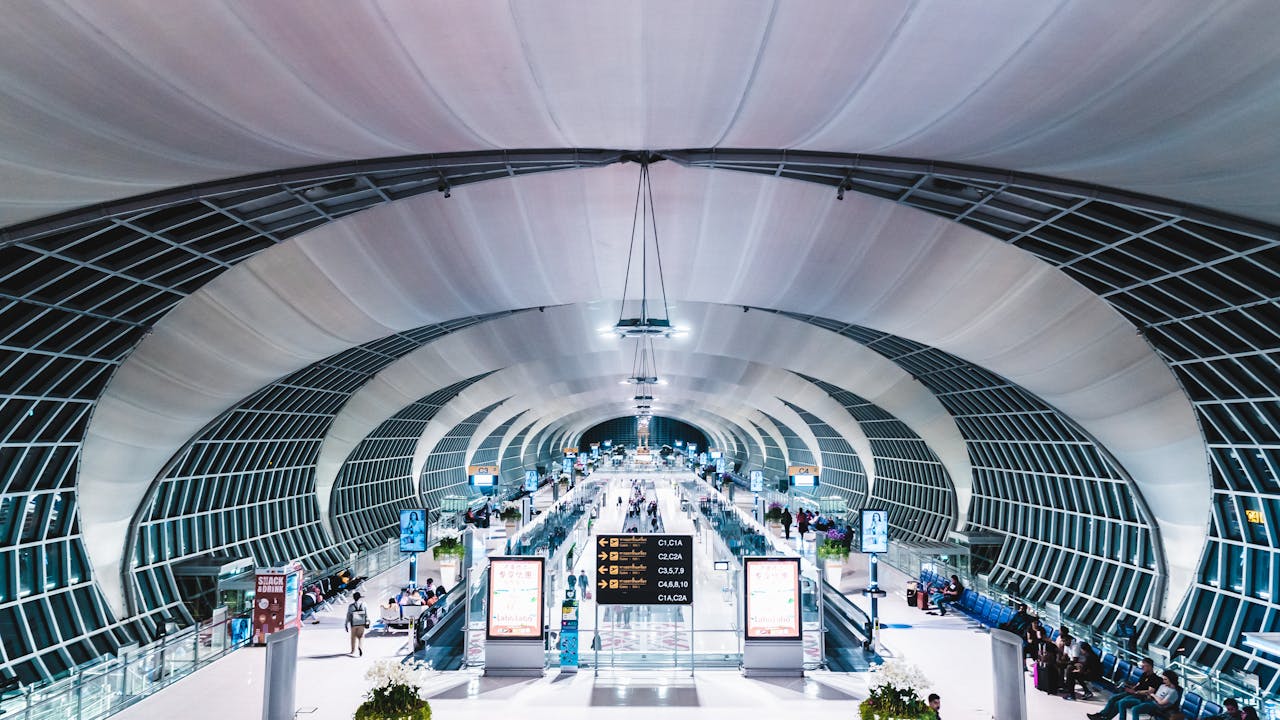 gallery-5 Explore the sleek design of Suvarnabhumi Airport's stunning terminal in Bangkok, Thailand.